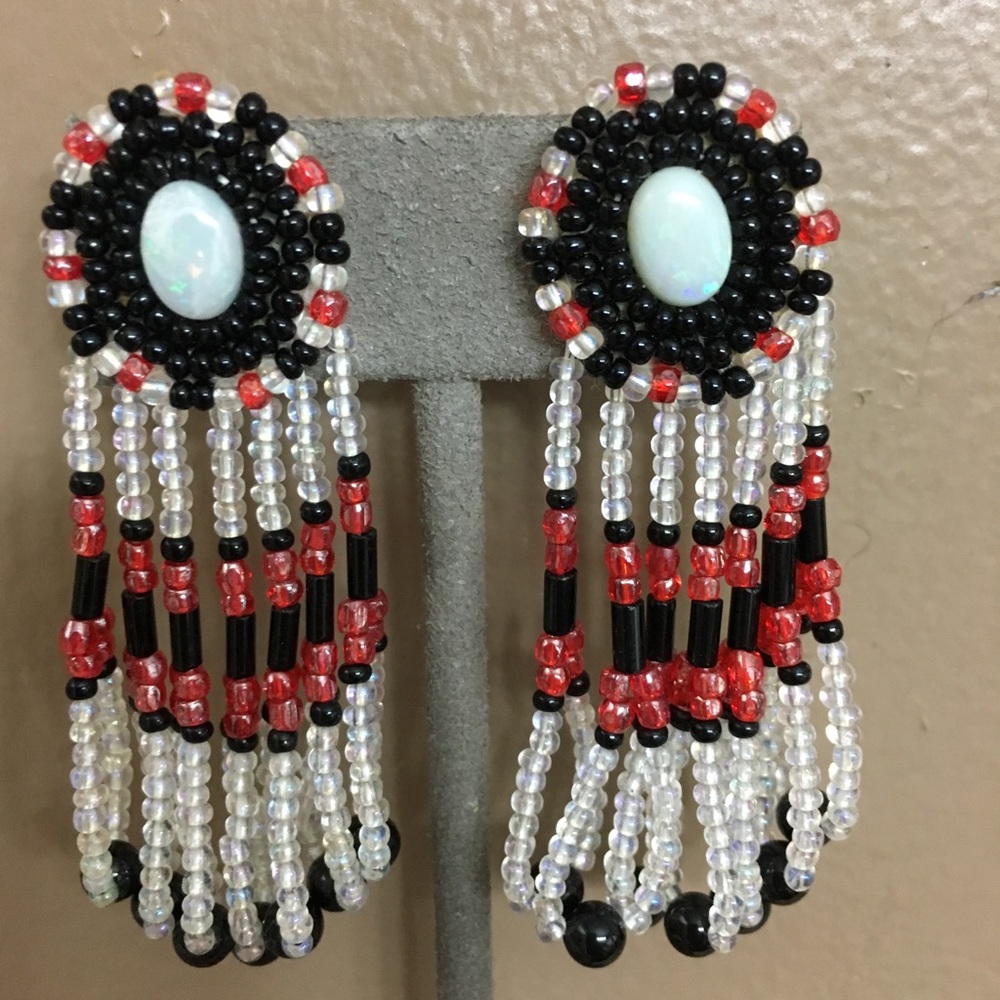 Beaded earrings with opal centers.